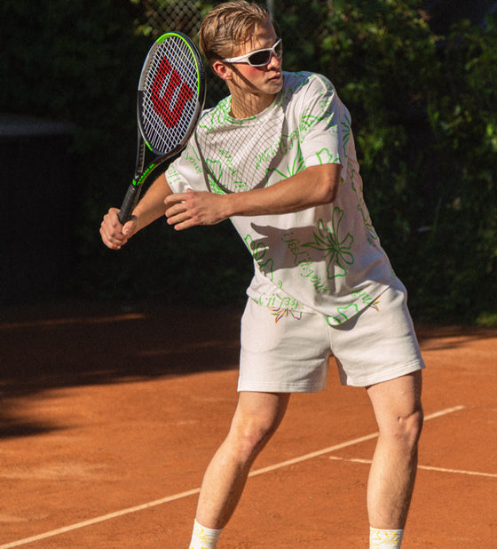 Cool gen z dude wearing printed tennis set
