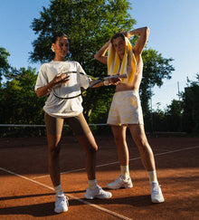  Cool gen z couple playing tennis